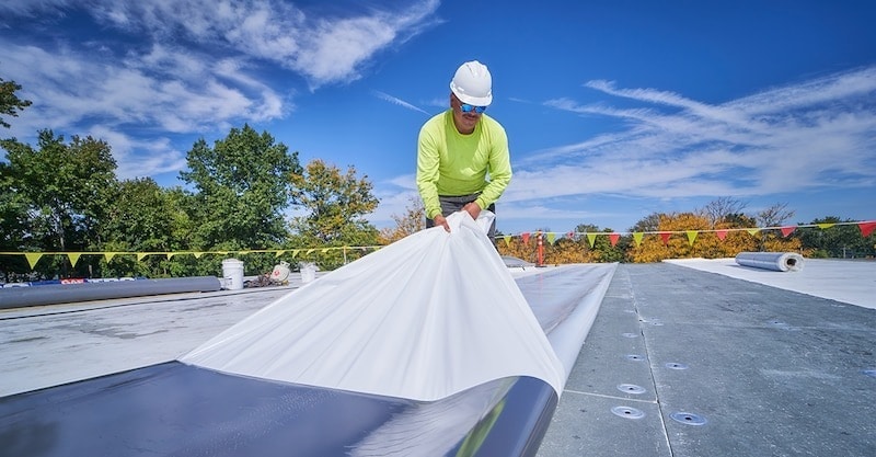 Certified GAF Roofing contractor installing TPO on commercial roof