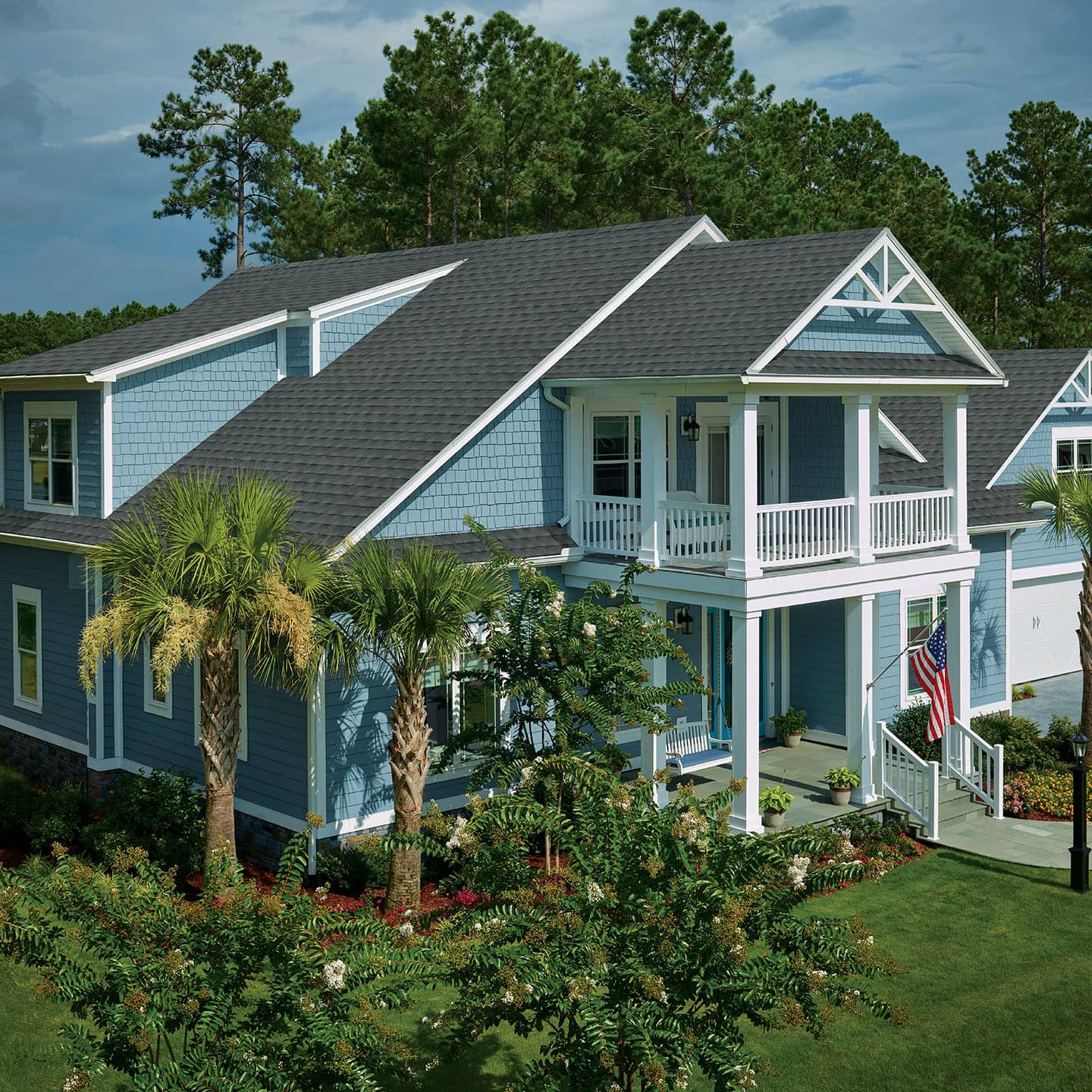 blue home with gray Timberline HDZ RS+ roof shingles
